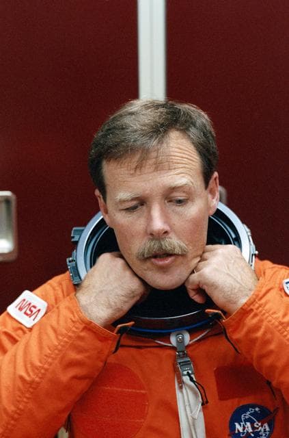 NASA image: STS-47 Commander Gibson dons LES prior to JSC launch egress training