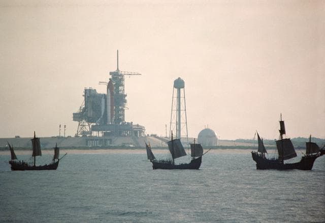 NASA image: Replicas of the Santa Maria, Nina, Pinta sail by OV-105 on KSC LC Pad 39B