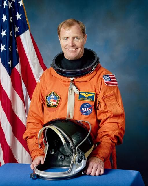 NASA image: Official Portrait of Astronaut David M. Walker in Launch Entry Suit (LES)