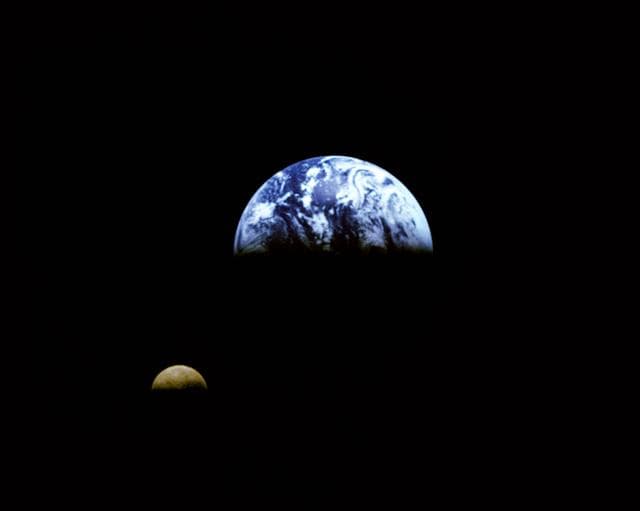 NASA image: Galileo view of Moon orbiting the Earth taken from 3.9 million miles