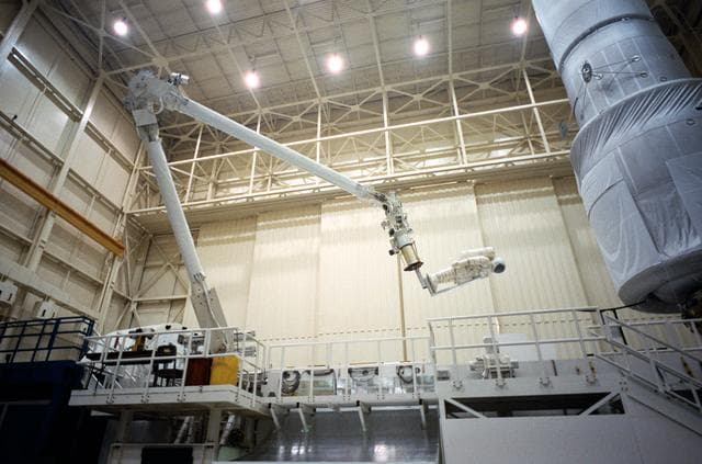 NASA image: STS-61 crewmembers training with the Remote Manipulator System