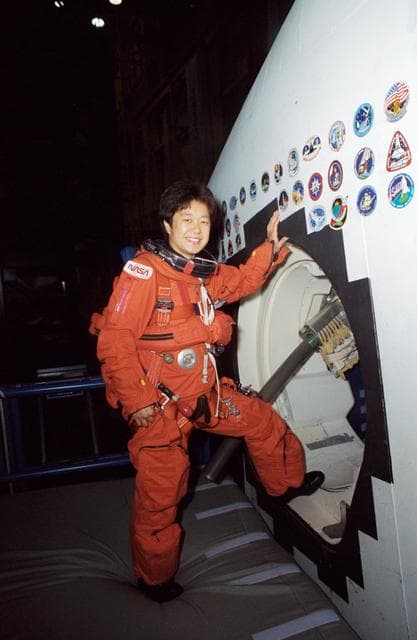 NASA image: STS-65 Japanese Payload Specialist Mukai at CCT side hatch during training