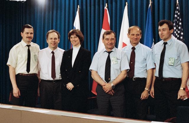 NASA image: STS-71 cosmonauts and astronauts greet news media during break in training