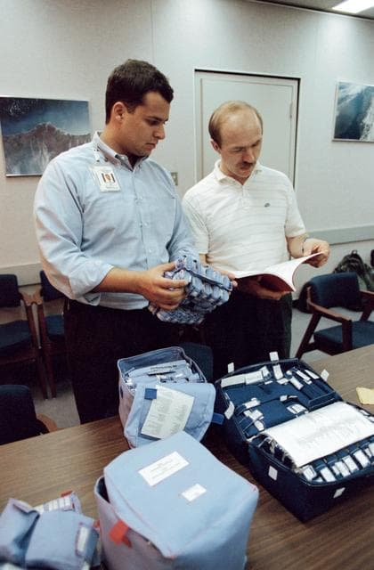 Cosmonauts and astronauts during medical operations training