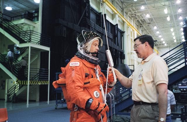 NASA image: Astronaut Michael E. Lopez-Alegria during post-landing egress training