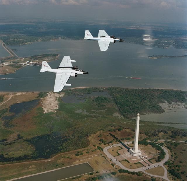 NASA image: Views of WB-57F's (NASA 26 and 28) in the air and on the ground