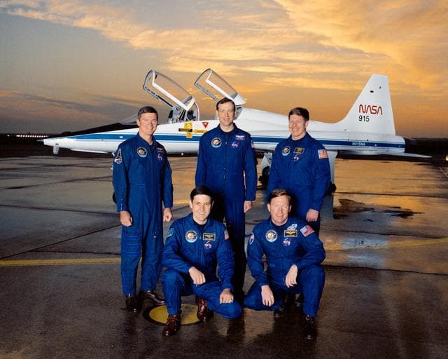 NASA image: STS-41 offical crew portrait taken in front of a T-38A at Ellington Field