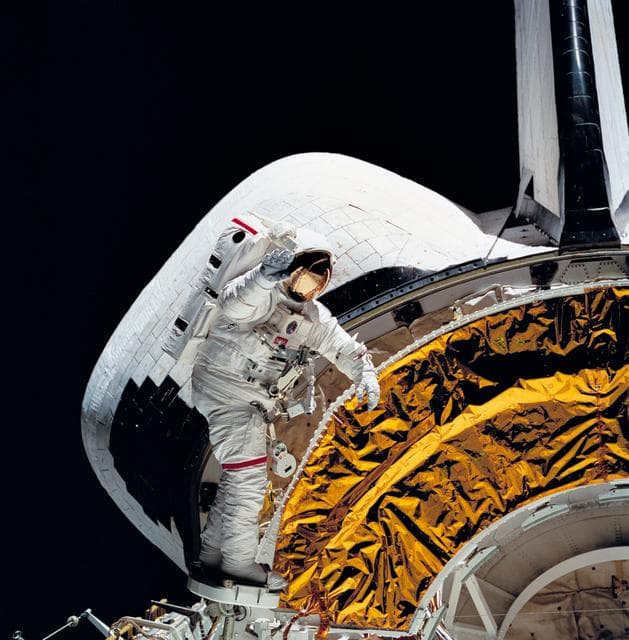 NASA image: Astronaut Carl Walz test portable foot restraint in aft cargo bay