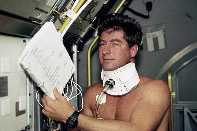 NASA image: STS-55 Pilot Henricks with baroreflex collar in SL-D2 module onboard OV-102