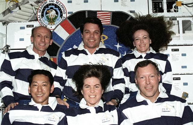 NASA image: The STS-99 crew pose for their inflight portrait on OV-105's middeck