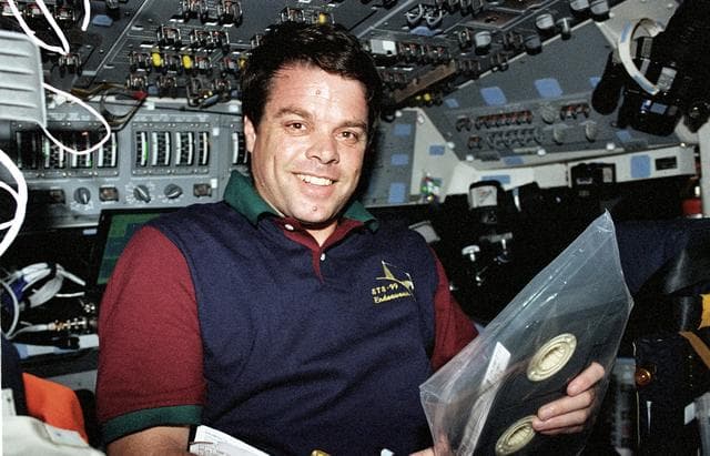 NASA image: STS-99 Commander Kregel poses for a photo on OV-105's flight deck