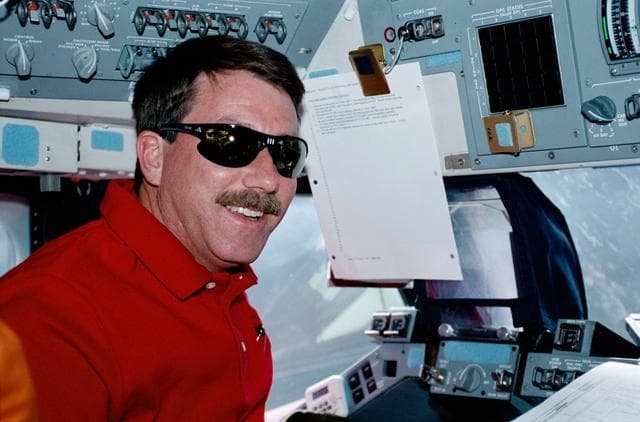 NASA image: Commander Rominger at the commander's workstation in Endeavour during STS-100