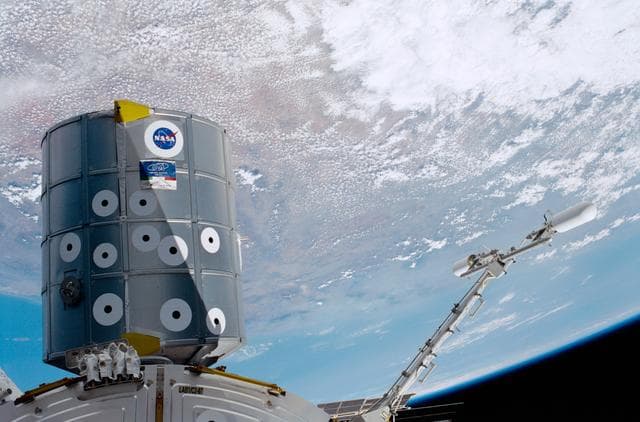 NASA image: View of the MPLM, Destiny and the UHF antenna taken during the second EVA of STS-100