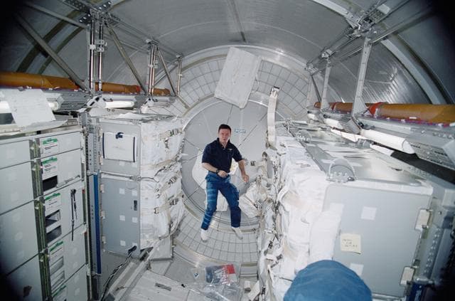 NASA image: Gidzenko and Krikalev in MPLM/Leonardo module