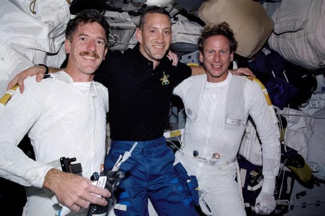STS-104 PLT Hobaugh with EVA crew MS Reilly and Gernhardt after EVA 1