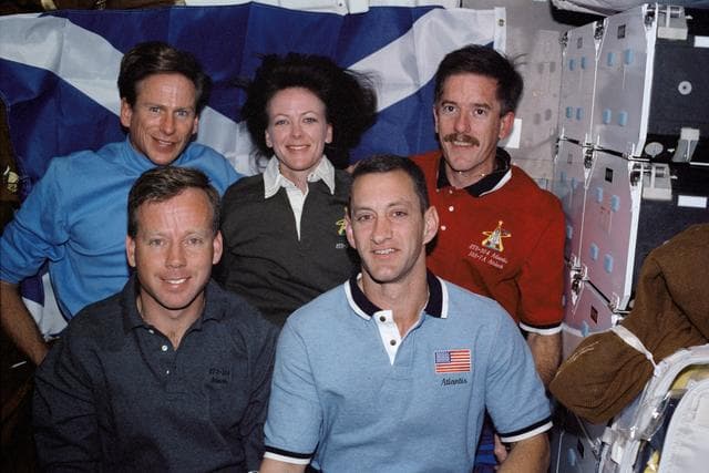 NASA image: STS-104 crew in-flight portrait in the Atlantis middeck