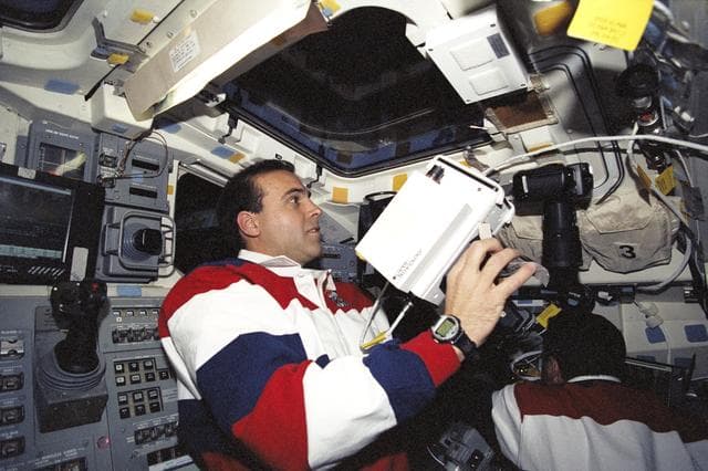 NASA image: MS Mastracchio uses the hand-held laser rangefinder during STS-106
