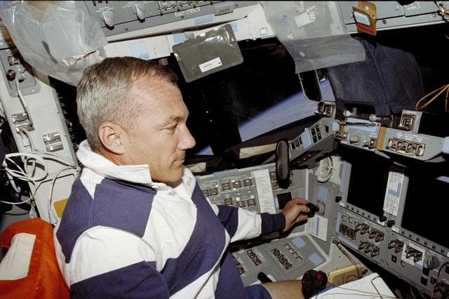 NASA image: Commander Wilcutt works at the commander's workstation during STS-106