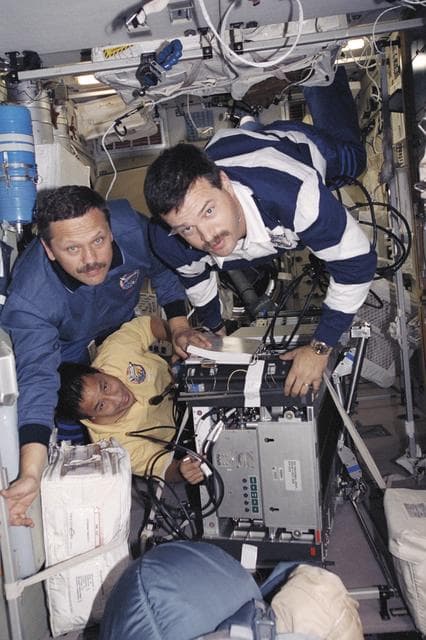 NASA image: Lu, Altman and Morukov work on TVIS in Zvezda during STS-106