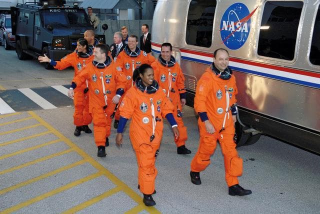 NASA image: STS-116 crew exits Operations and Checkout Building