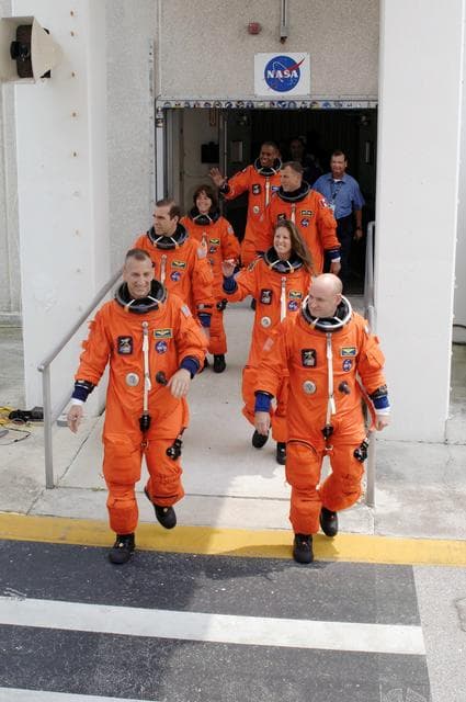 NASA image: View of the STS-118 Crewmembers as they make their way to the KSC 39A Launch Pad
