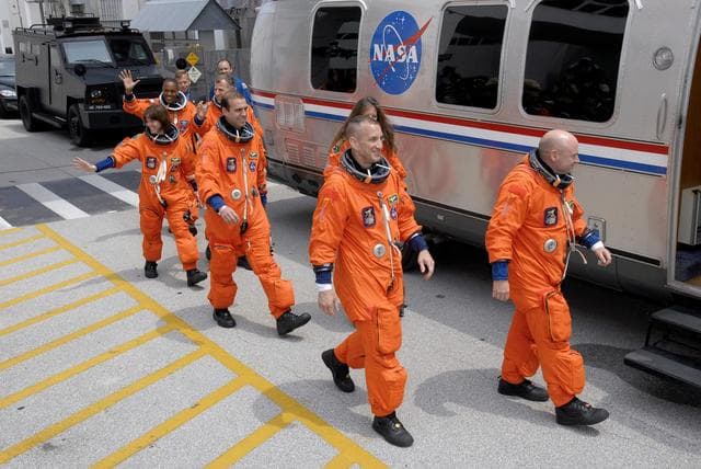 NASA image: View of the STS-118 Crewmembers as they make their way to the KSC 39A Launch Pad