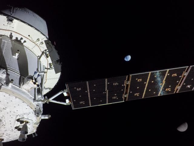 NASA image: Flight Day 13: Earth, Array, and Moon