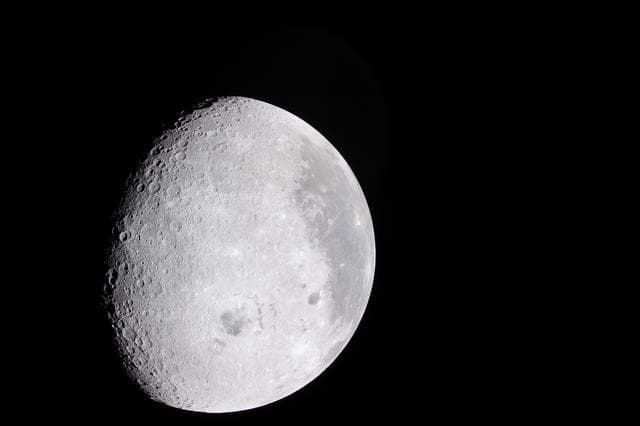NASA image: Dark Craters, Bright Views