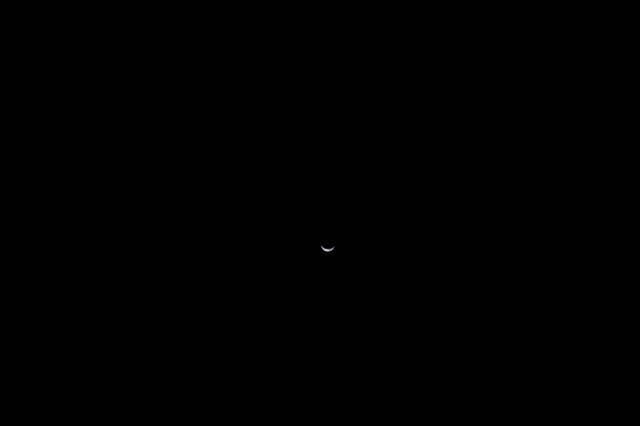 NASA image: Distant Waning Crescent Earth