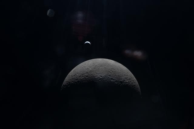 NASA image: Crescent Earth Over Lunar Horizon
