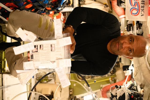 NASA image: Victor Glover Shows Off Immune Biomarkers Sample Bag