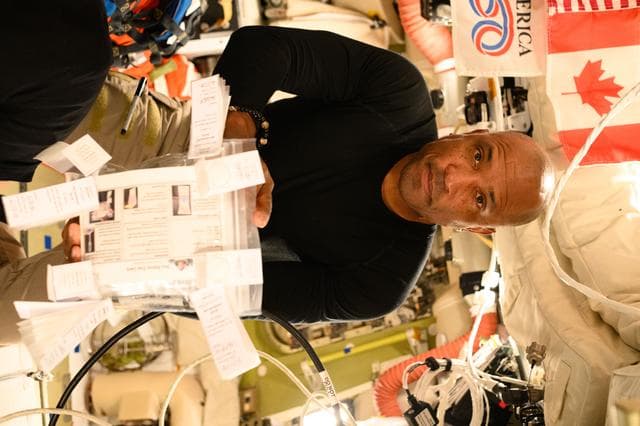 NASA image: Victor Glover Shows Off Immune Biomarkers Sample Bag