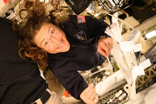 NASA image: Christina Koch Readies for Saliva Sample Collection