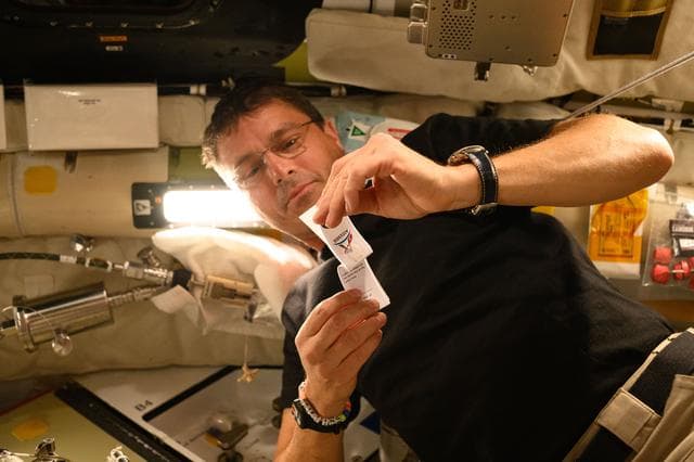 NASA image: Reid Wiseman Prepares to Collect Saliva Sample