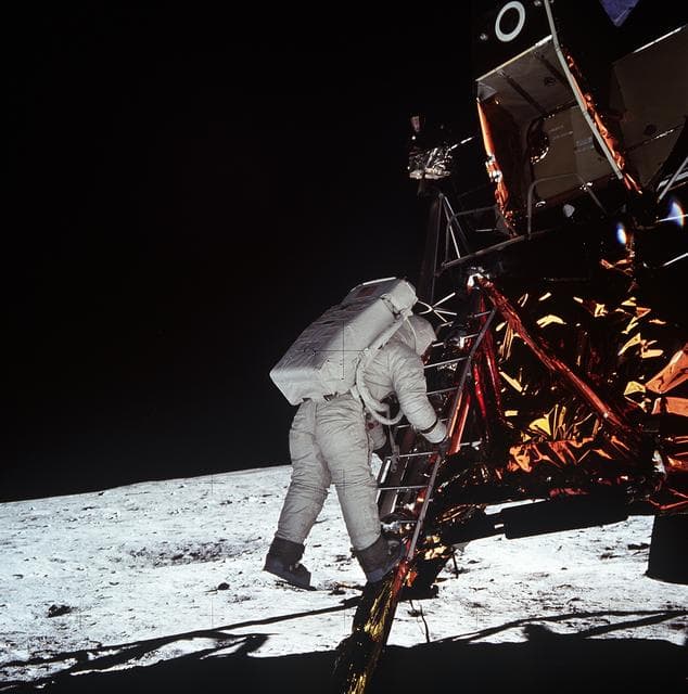 NASA image: Astronaut Edwin Aldrin descends steps of Lunar Module ladder to walk on moon