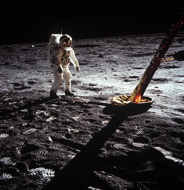 NASA image: Astronaut Edwin Aldrin walks on lunar surface near leg of Lunar Module