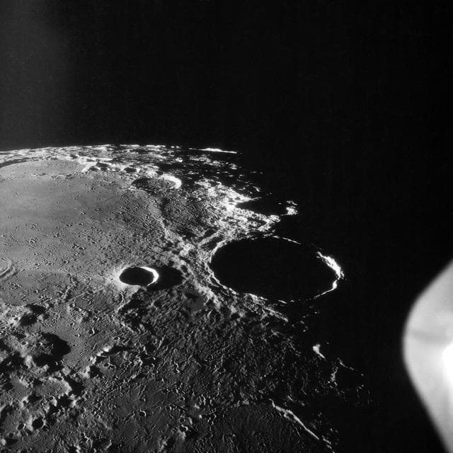 NASA image: Oblique view of crater Theophilus at northwest edge of Sea of Nectar