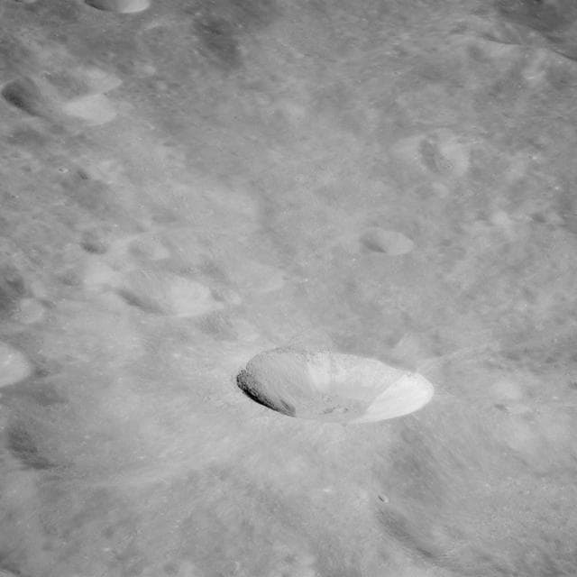 Northeasterly, low-oblique view of unnamed crater on lunar farside