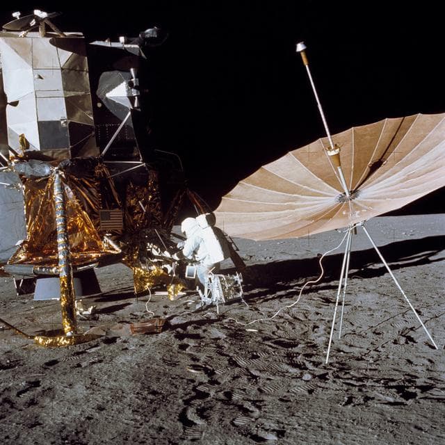 NASA image: Astronaut Charles Conrad stands at Modular Equipment Stowage Assemble