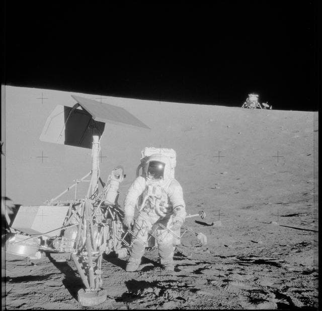 NASA image: Apollo 12 Mission image - Astronaut Alan L. Bean,lunar module pilot,and two U.S. spacecraft 