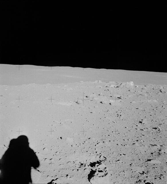 NASA image: Apollo 14 crewmen photographs field of boulders on flank of Cone Crater