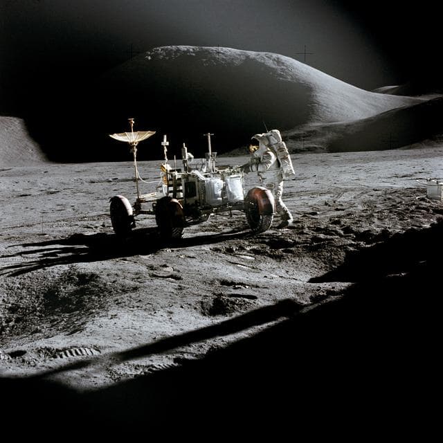 NASA image: Astronaut James Irwin works at Lunar Roving Vehicle during Apollo 15 EVA