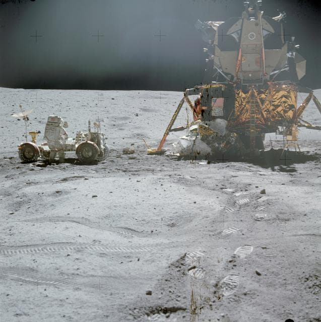 Astronaut John Young at LRV prior to deployment of ALSEP during first EVA
