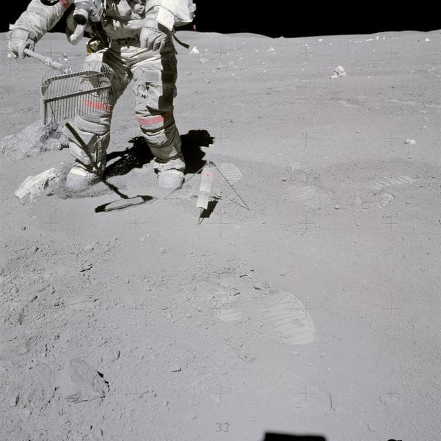 NASA image: Astronaut John Young collecting samples at North Ray crater during EVA