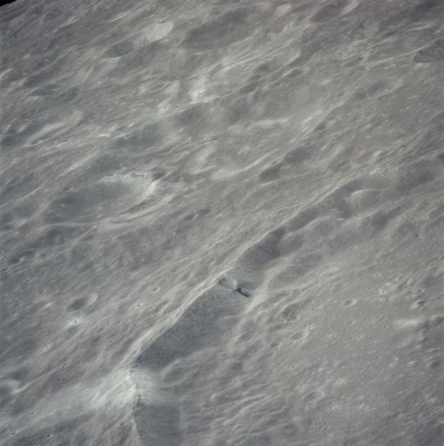NASA image: Oblique view of rim of Guyot crater on lunar farside as seen by Apollo 16