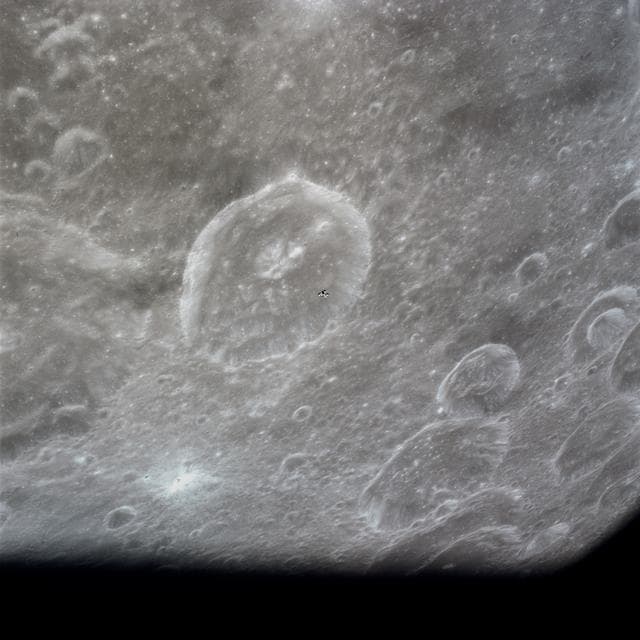 NASA image: Apollo 16 Mission image - View of the Schubert B Crater during LM Rendezvous.