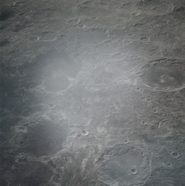 NASA image: Apollo 16 Mission Image - View of the Al-Biruni and Goddard Craters.
