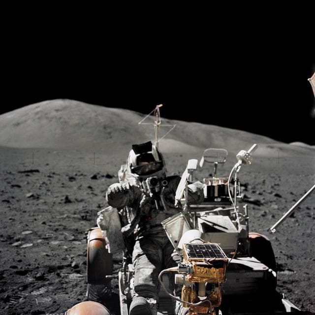 NASA image: Astronaut Harrison Schmitt seated in Lunar Roving Vehicle during EVA-3