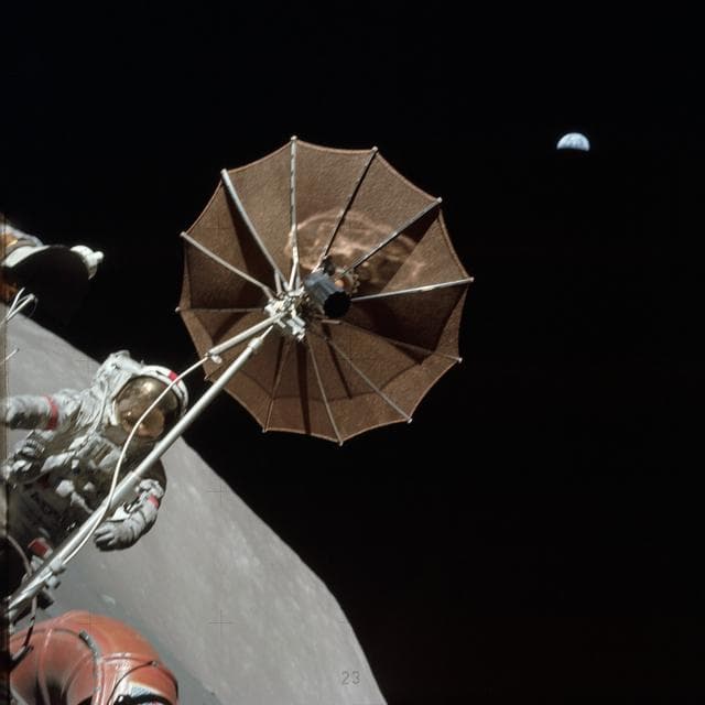 View of Earth above the antenna of the lunar roving vehicle during EVA