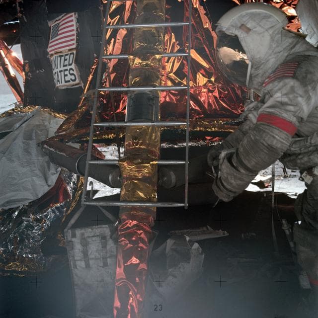 NASA image: Astronaut Eugene Cernan prepares to mount ladder to lunar module ascent stage